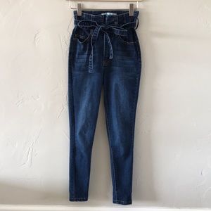 High waisted skinny jeans with bow tie